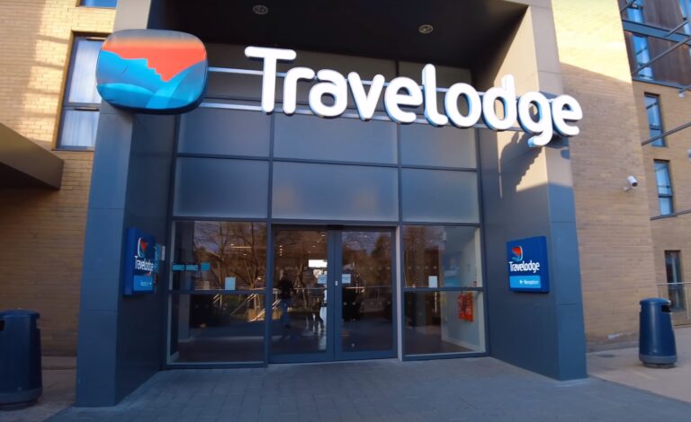 the main entrance of a Travelodge hotel in Cambridge, UK