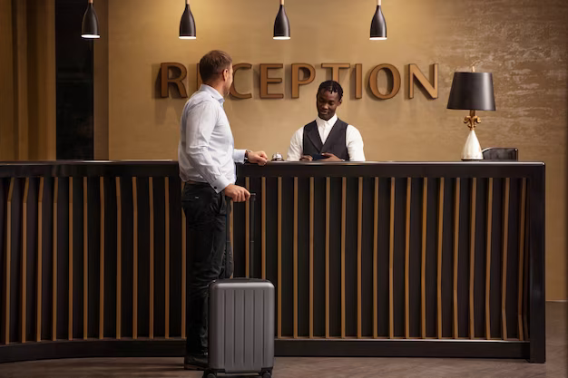 Man at the reception in a hotel